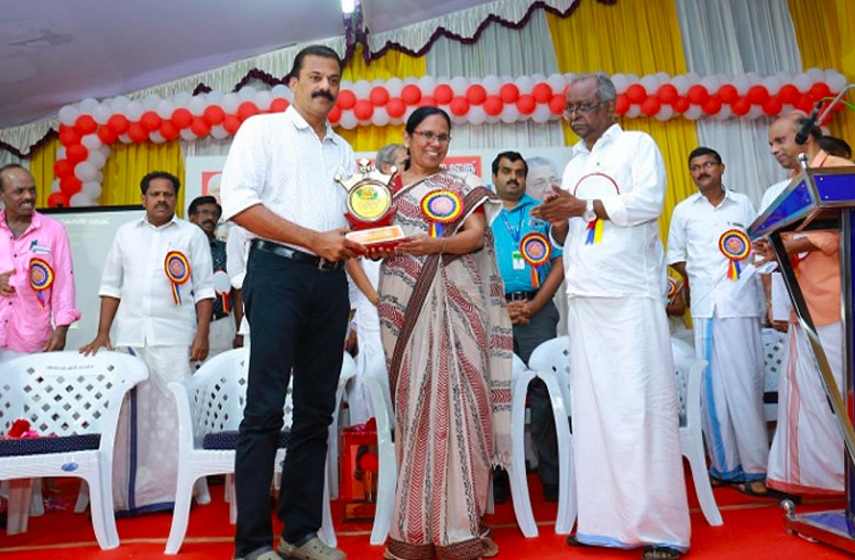 C.P Manoj, Managing Director of Silicon IT Solutions receiving award from Smt. K.K.Shylaja teacher (Hon. Minister for health & social welfare, Govt of Kerala) - for the complete digitalization of Kadirur Service Co-Op Bank Ltd., Kannur Dist.