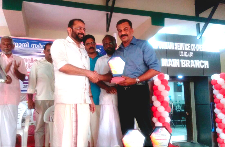 C.P Manoj, Managing Director of Silicon IT Solutions receiving award from Sri.Sreeramakrishnan (Hon Speaker, Kerala Legislative Assembly) - for complete digitalization of Ponnani Service Co-Op Bank ltd.